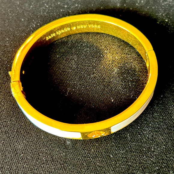 Kate Spade large bangle. Cream and gold with gold decorations for on the cream. - Picture 2 of 6